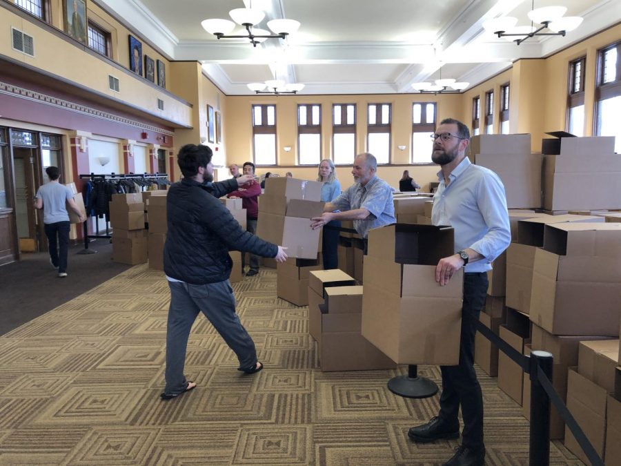 Faculty and staff distributed packing boxes to students in the Root Room in Carnegie Building beginning March 13. Students in College housing were required to vacate campus by Monday, March 16 at noon. 
